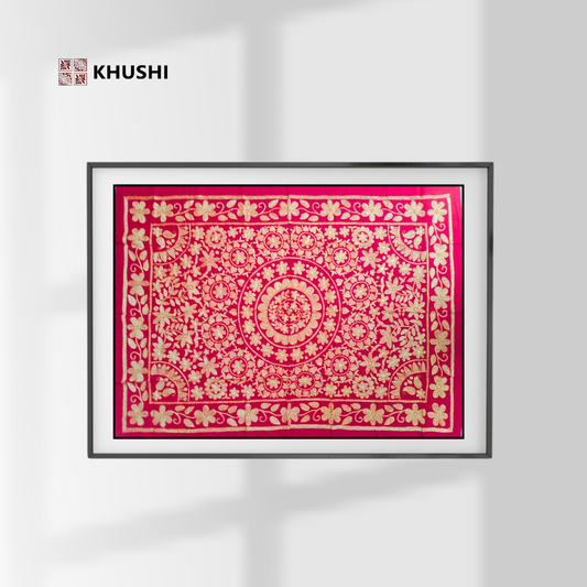 Framed pink and gold patterned fabric with KHUSHI branding on a white background