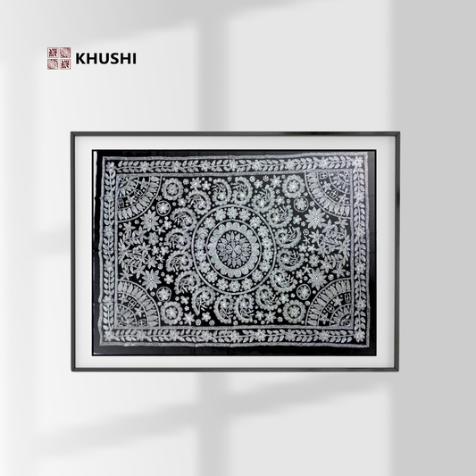 Decorative black and white patterned fabric with 'KHUSHI' branding on a light gray background
