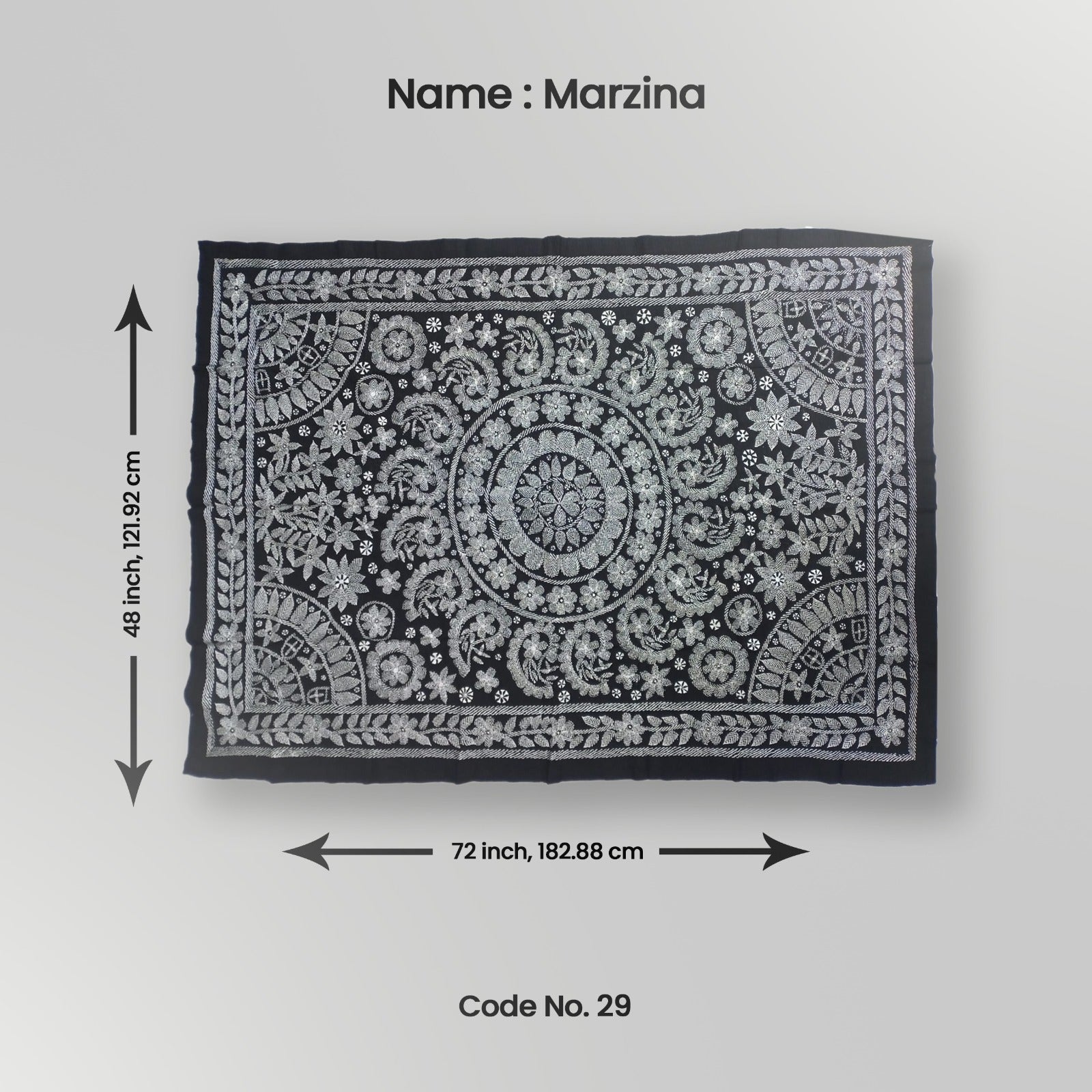 A black decorative throw with white floral patterns laid flat, measuring 48 inches by 72 inches.
